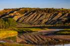 Cliffs reflection in the Little Missouri River at sunrise in Theodore Roosevelt NP, North Dakota. Art Print